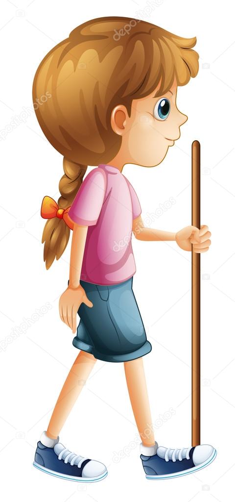 A young lady hiking with a stick