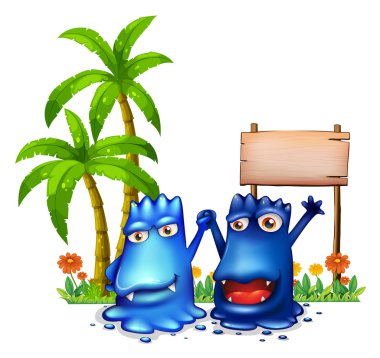 Two happy blue monsters in front of the wooden signage near the clipart