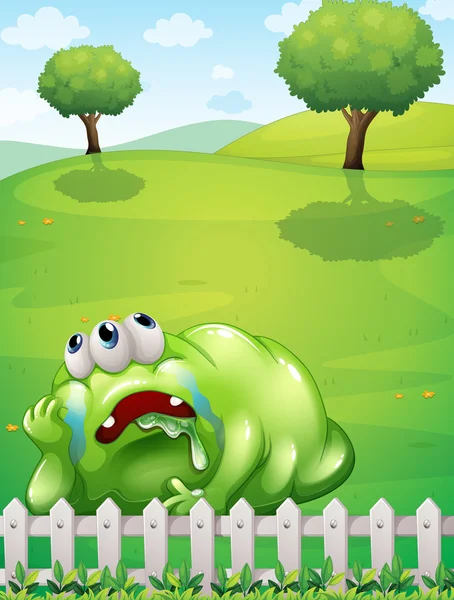 A tired monster at the hilltop resting near the fence — Stock Vector