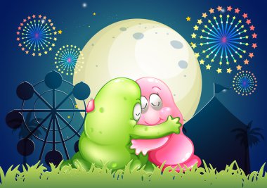 pembe ve yeşil canavar am önünde birbirlerine sarılma