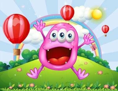 bir tepe ile çok mutlu bir pembe canavar atlama