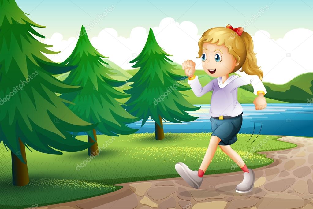 A girl jogging near the pine trees at the riverbank