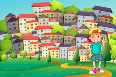 hilltop köyün duran genç bir çocuk
