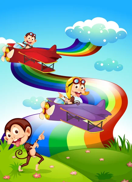 Un cielo con arco iris y aviones con monos — Vector de stock