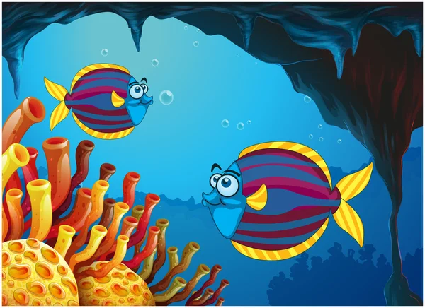 Two colorful fishes inside the cave under the sea — Stock Vector
