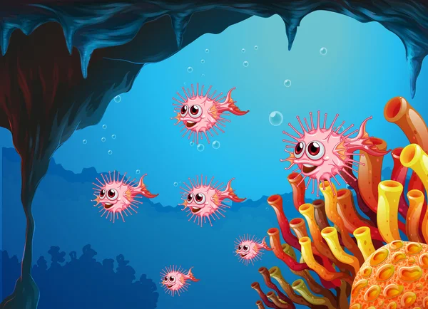 Peixes-balão dentro da caverna do mar — Vetor de Stock