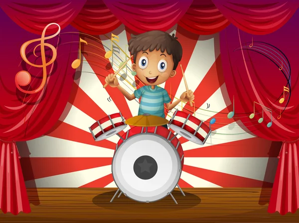 Un niño en el centro del escenario con un tambor — Vector de stock