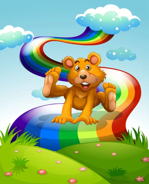 A playful brown bear jumping near the rainbow — Stock Vector