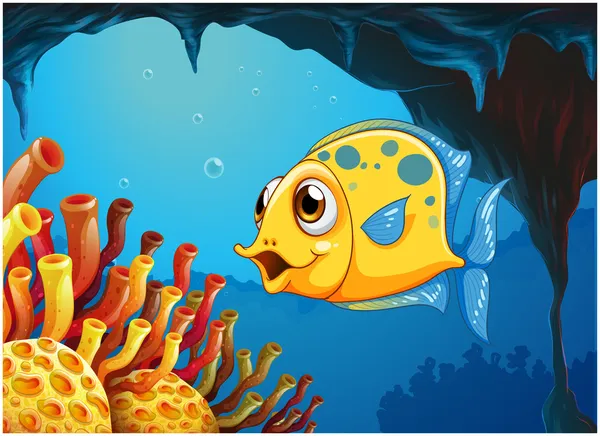 A big yellow fish under the sea inside the sea cave — Stock Vector