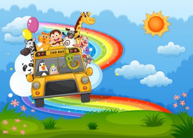 A zoo bus at the hilltop with a rainbow in the sky