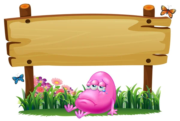 A pink beanie monster under the empty wooden signboard — Stock Vector