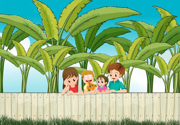 A sad mother with her family at the fence — Stock Vector