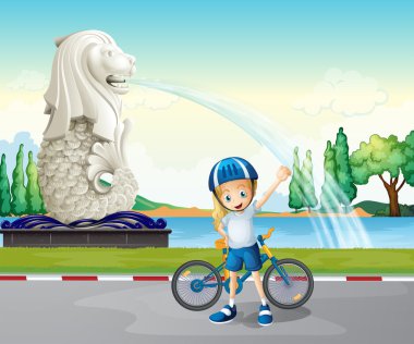 merlion heykeli yanında genç bir motorcu