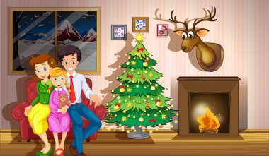 bir aile ile Noel ağacı odanın içinde