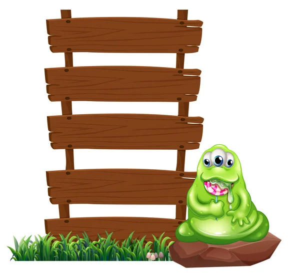 Een monster naast de lege houten planken — Stockvector