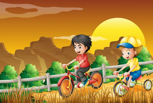 Діти катаються на велосипеді в лісі — стоковий вектор