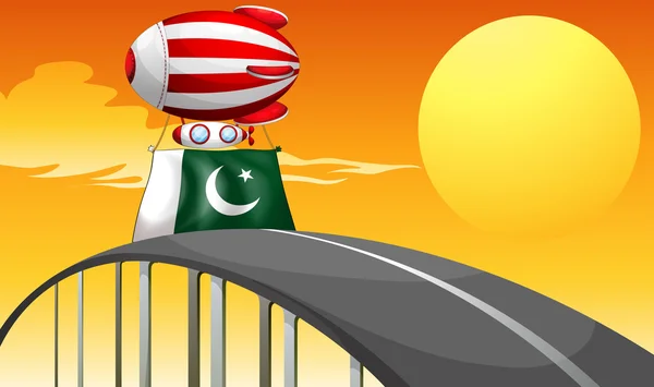 Um balão flutuante com a bandeira do Paquistão —  Vetores de Stock