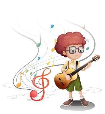 Gitar çalan genç bir müzisyen.