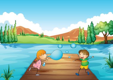 bir genç kız ve çocuk ile baloncuklar oynamak
