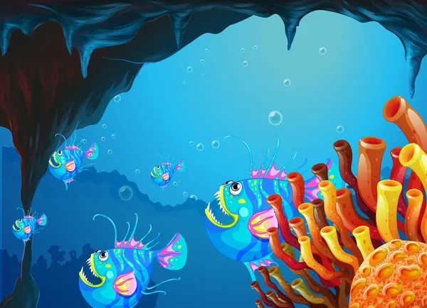 A cave under the sea with a school of fish — Stock Vector