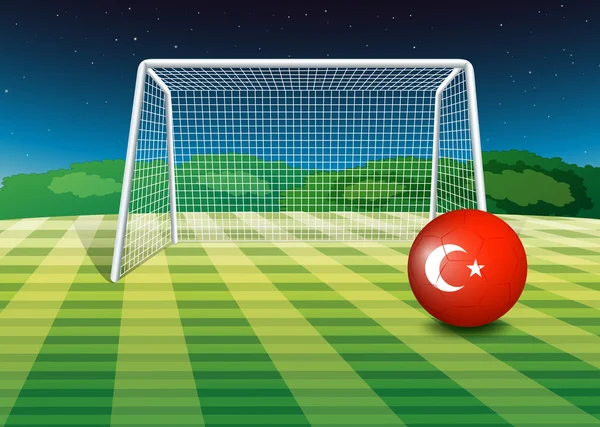 Uma bola no campo de futebol com a bandeira da Turquia —  Vetores de Stock
