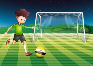 brunei bayrağı ile topu tekmelemek bir futbolcu