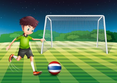 A soccer player kicking the ball with the flag of Thailand vector A soccer player kicking the ball with the flag of Thailand vector