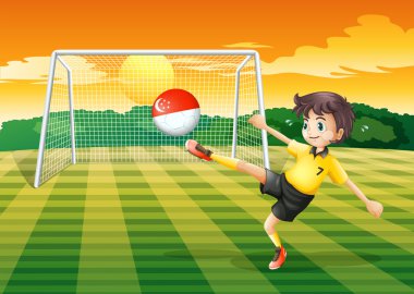 Singapur bayrağı ile topu tekmeleme erkek futbol oyuncusu