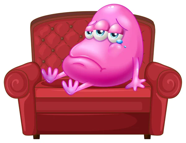 Плачущий монстр сидит на красном диване — стоковый вектор