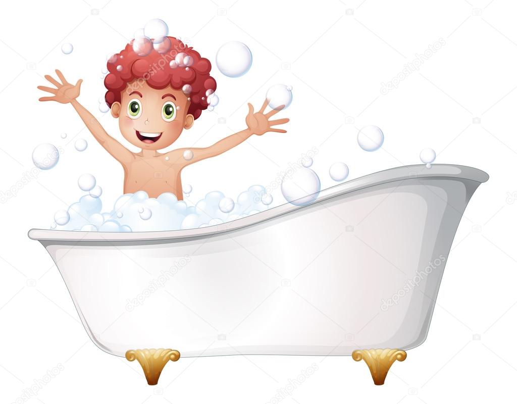 A bathtub with a young boy playing