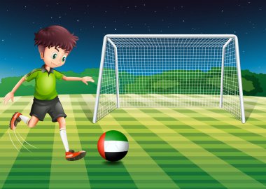 A male athlete kicking the ball with the flag of the United Arab vector A male athlete kicking the ball with the flag of the United Arab vector