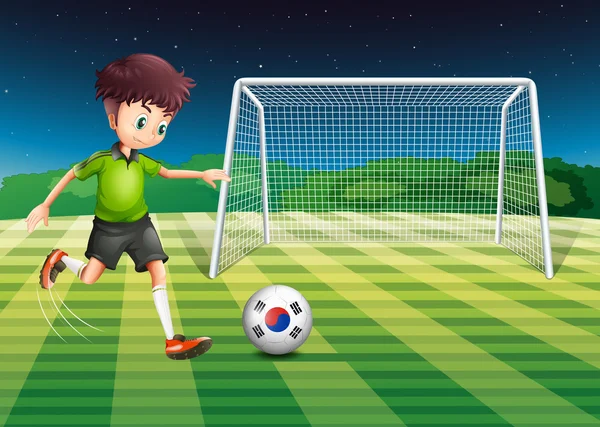 A boy kicking the ball with the South Korean flag — Stock Vector