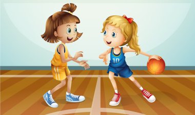 iki genç Bayanlar basketbol oynarken