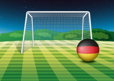 Almanya bayrağı ile net yakınındaki bir futbol topu
