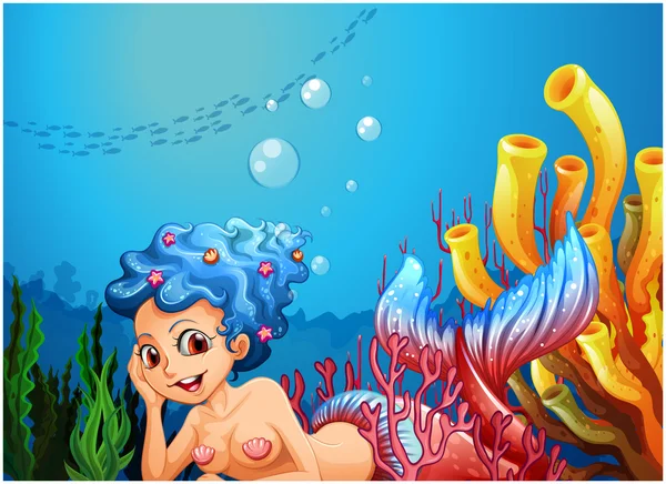 Una sirena cerca de los arrecifes de coral — Vector de stock