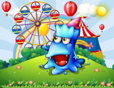 tepenin bir karnaval ile mutlu bir mavi monster