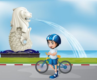 merlion heykeli yanında genç bir motorcu