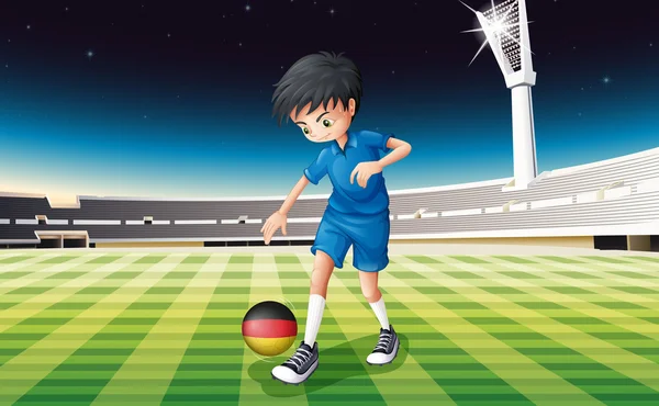 Un niño en el campo usando la pelota con la bandera de Alemania — Vector de stock