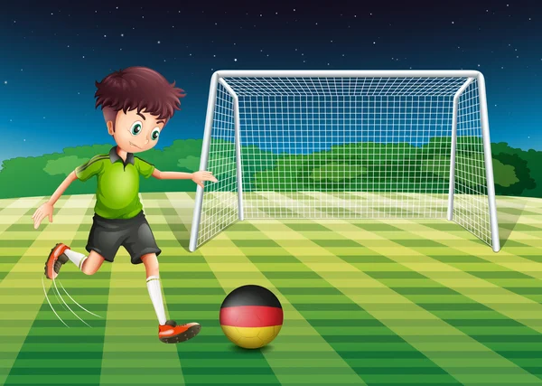 A man at the field using the ball with the flag of Germany — Stock Vector