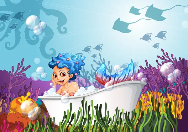 A bathtub under the sea with a mermaid — Stock Vector