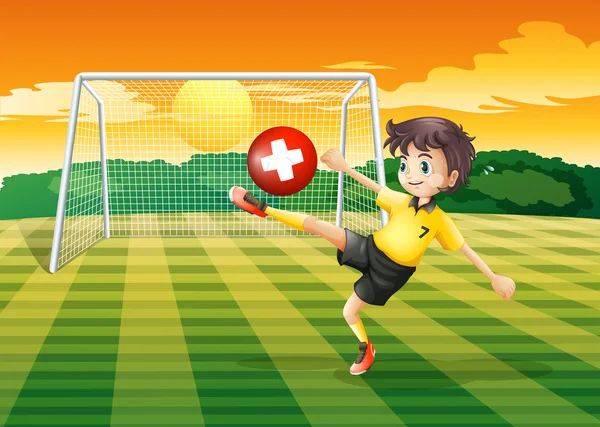 A girl at the field kicking the ball with the flag of Switzerlan — Stock Vector