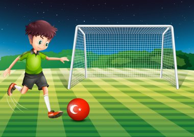 A boy kicking the ball at the field with the flag of Turkey vector A boy kicking the ball at the field with the flag of Turkey vector