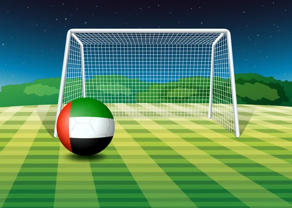 Un pallone da calcio in campo con la bandiera degli EAU — Vettoriale Stock