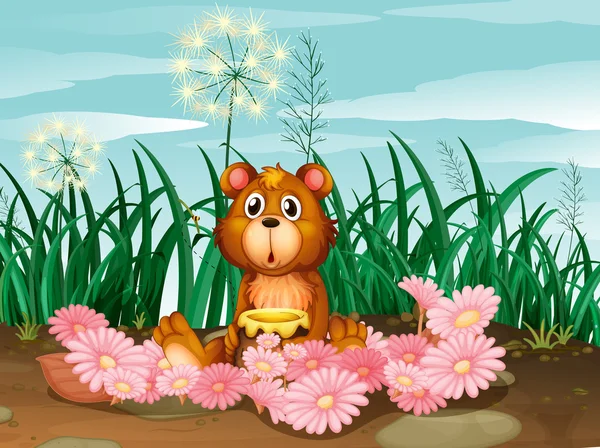 A cute bear with pink flowers — Stock Vector