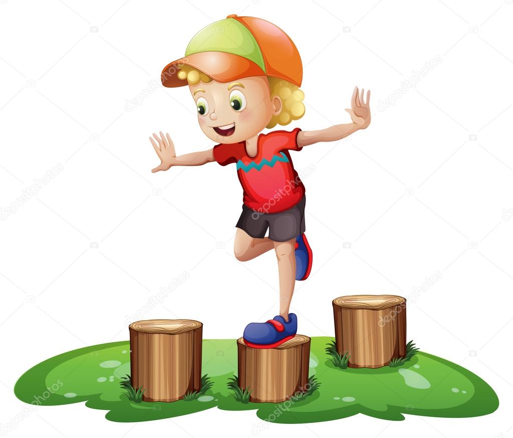 A young boy playing with the stump