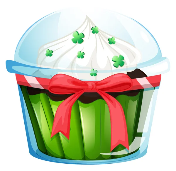 A cupcake container with a green cupcake and a pink ribbon — Stock Vector