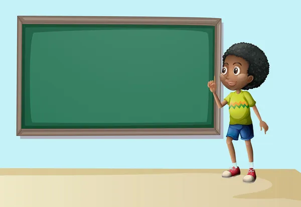 A boy near the empty blackboard — Stock Vector