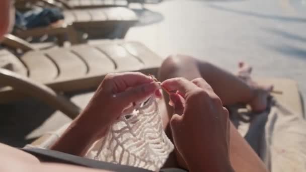 Young Woman Sit Public Pool Knit Some Wearing Relaxing Outdoors — Stock Video