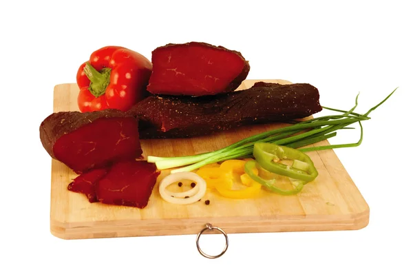 Jerky Kazakh (sur-et) on a wooden board — Stock Photo, Image