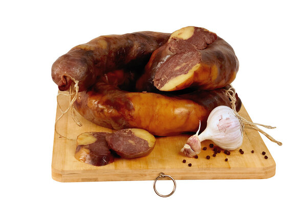 Smoked horse meat (shuzhuk) on a wooden board